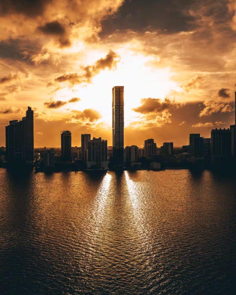 Sunrise over Miami skyline symbolizing ARCSA CAPITAL’s secure, institutional pathway to building wealth through predictable real estate returns.