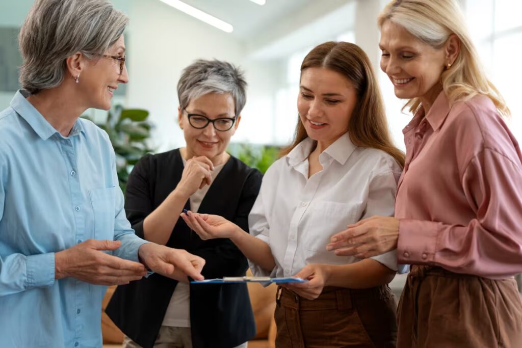 Senior professional women collaborating in modern office environment